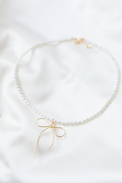 Aurora cutie bow baby pearl necklace