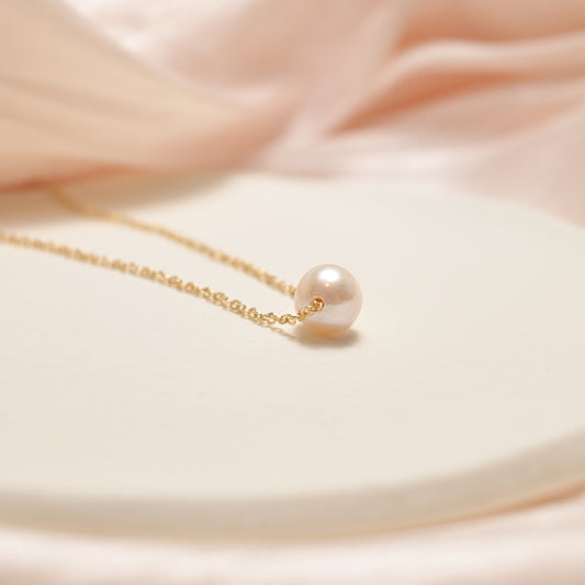 Less is more single pearl necklace