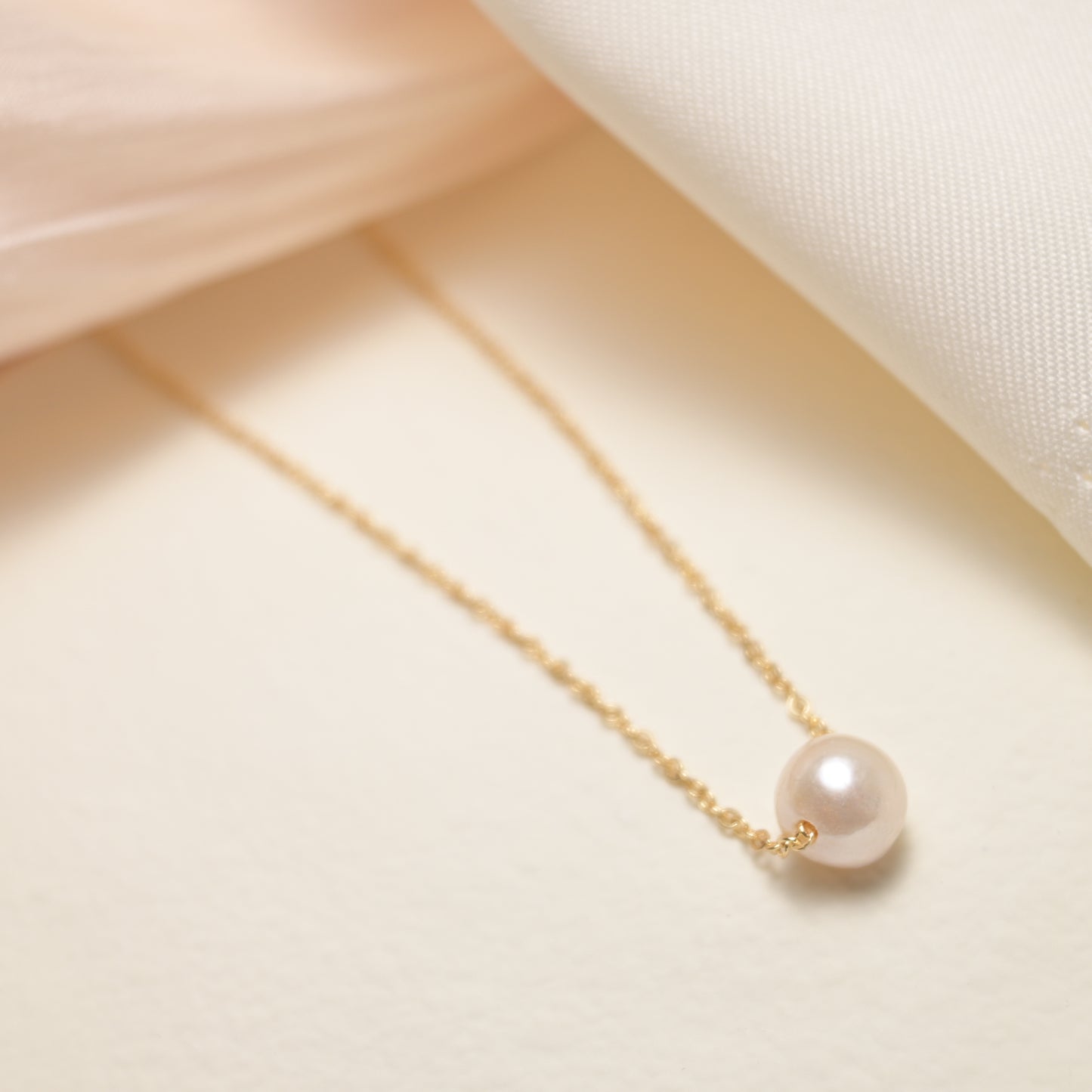 Less is more single pearl necklace